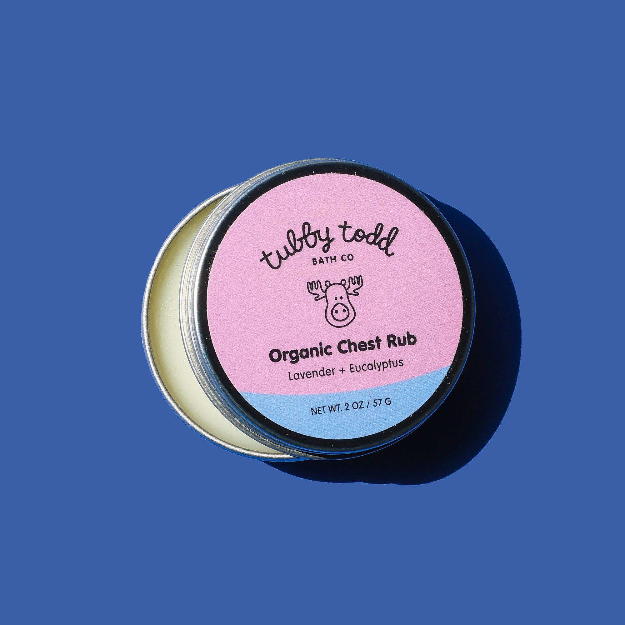 Tubby Todd Organic Chest Rub container on a blue background